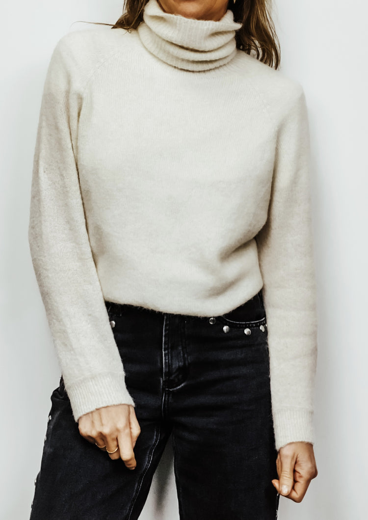 Pull col roulé blanc