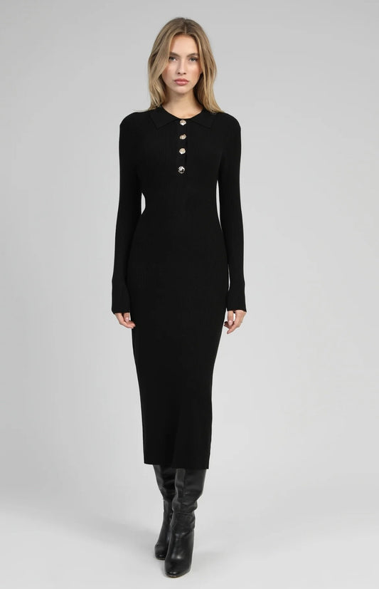 Robe polo noire avec boutons dorés